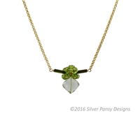 Dark Green Tourmaline make the bar that holds a cluster of Green Peridot Gemstones and a diamond set drop of soft Green Praisiolite. Hand crafted in the U.S. by Silver Pansy. Gold Filled Wheat Chain 17-18 inch length. Pendant 1 1/4' wide, 1" long.