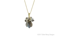 Soft Grey/Blue barrel cut Labradorite works beautifully with White Keshi Pearls. Each Pearl has a small Labradorite Stone at the center. A cluster of Pearls & 3 Labradorite drops. Gold Filled Wheat Chain 17" long. Pendant 1 1/2" L x 3/4" W. Silver Pansy