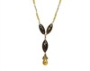 A beautiful Barrel Labradorite Gemstone Necklace. Center drop features a barrel cut Labradorite and a single Citrine with a cluster of Green Sapphires. The chain is Gold Filled Sterling with Citrine. Lobster Clasp. Made in U.S. Length 18", Drop 1 3/4"