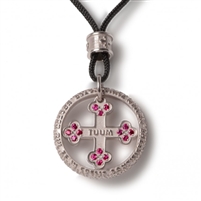 Tuum's best expression of their passion for craftsmanship can be found in the Pendant version of FLORE-symbol of life, in White Rhodium sterling, Red Ruby gemstones, and the micro sculpture Latin relief of "Pater Noster" (Lords Prayer) on the outer ring