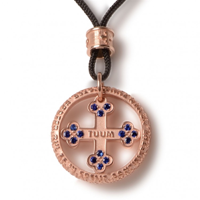 Tuum's best expression of their passion for craftsmanship can be found in the Pendant version of FLORE-symbol of life, in Rose Gold plated sterling, Blue Sapphires, and the micro sculpture Latin relief of "Pater Noster" (Lords Prayer) on the outer ring