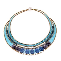 this statement Necklace in various shades of Blue is sure to get noticed. Blue Kyanite, Zircon, Apatite & Iolite Gemstones compliment each other. Accented with White Water Pearls and Murano Glass Seed Beads on Stainless Steel wire. Made in Italy by Ziio