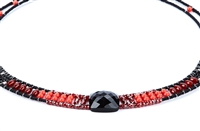 beaded Armonia Necklace in various hues of Red & Black Gemstones - Carnelian, Red Zircon & simulated Coral with a large faceted Onyx Bead at the center.  A great beaded piece to add a subtle touch of color. Hand crafted in Italy on Stainless Steel wire