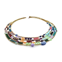 The "Cici" Bib Necklace by Ziio is a masterpiece of rich multi-colored Gemstones. Purple Amazonite & Amethyst, Green Chrysophrase, Red Garnet, Blue Kyanite, Iolite, Lapis & Agate, Orange Carnelian - beautifully blended together and accented