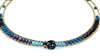 Ziio's thin Giro Necklace in various hues of Blue Gemstones - Lapis, Iolite, Blue Zircon & Black Tourmaline. A great beaded piece to add a subtle touch of color. Hand crafted in Italy on Stainless Steel wire with Murano Glass Seed Beads