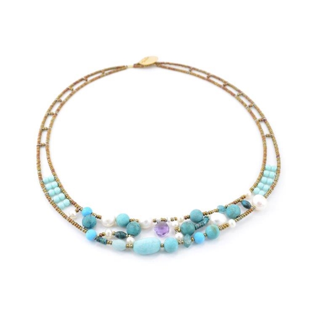 this beaded Gemstone Necklace is a beautiful medley of Blue's in various sizes -  Amazonite, Magnesite & Turquoise - accented with Water Pearls and Purple Amethyst. Made in Italy on Stainless Steel wire with golden Murano Glass beads. made in italy