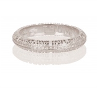 LA FEDE is a unique, finely detailed eternity Ring or Wedding Band obtained through a unique casting process. What at looks like a decoration, is a perfect micro-sculpture with the Latin â€œPater Noster" (Lords Prayer) words written on it. 18k white gold