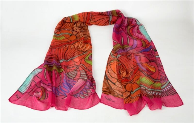 Ziio's Pink Jungle Print Shawl in a blend of 90% Modal & 10% Cashmere. A beautiful pattern in Pink, Orange and Cream with shades of Green & Blue. Very light in weight. Made in Italy with a hand rolled finished edge. L 82" X W 27"