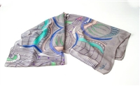 Ziio's Jungle Print Cashmere Shawl in Grey. A beautiful pattern in Grey, Blue, Pink, Green and Cream. Made in Italy with a hand rolled finished edge. L 82" X W 27"
