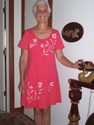 Red playdress with flowers and dragonflies