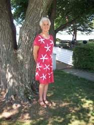 Short-sleeved playdress with all-over starfish design