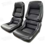 1-423221 82 Mounted Leathr Seat Covers. Charcoal Lthr/Vnyl Original 2--Bolstr