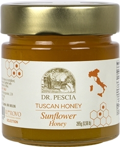 A jar of raw sun flower honey,