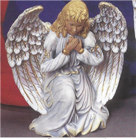A cast ceramic figure of a kneeling angel with their hands clasped to their chest. They have long blonde hair and wear a long white gown with gold accents at the end of each long sleeve. Their white wings are stretched behind them.