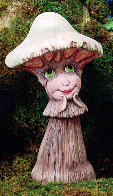 A cast ceramic figure of a cartoonishly styled humanoid mushroom. It has large, wide open eyes and smiling lips below its domed cap, and two segments of its stem are curled like hands against its chin. It looks upwards.