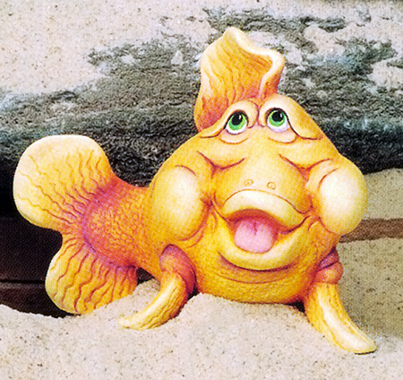 A cast ceramic figure of a cartoonishly styled fish with a humorous expression. It gazes upward, mouth held open with visible tongue. It is posed with its tail slightly to one side and its pectoral fins against the ground in front of it, raising it.