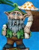 A cast ceramic figure made of multiple pieces assembled into a cartoonish gnome. He has a large nose and ears, a pointed cap, and long facial hair. He stands, holding a single very large mushroom in his left hand and a bundle of small ones in his right.