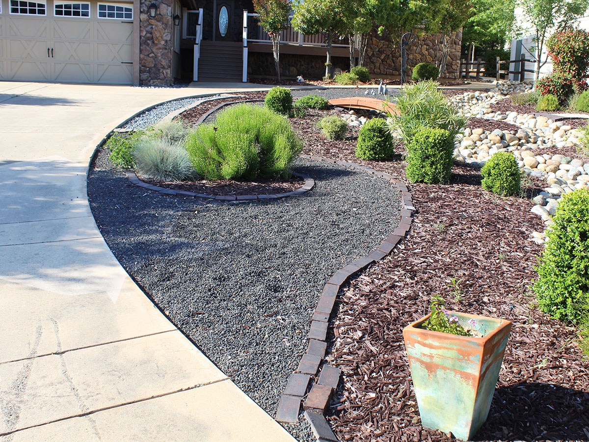 Transform Your Landscape with Black Decorative Rock Landscaping