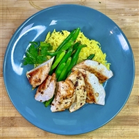 Chicken breast slow marinated in our garlic italian seasoned marinade. Served with rice pilaf and garlicky green beans.