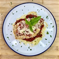 Slow baked chicken breast triple coated to lock in moisture with the crispiness desired. Served over gluten free linguine with our tomato sauce topped with freshly grated cheddar.