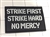 Strike First Strike Hard No Mercy Morale Patch, Black