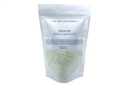 Mixture of bath bomb dust, bath salts, and organic butters scented with lemongrass, bergamot, lemon verbena.