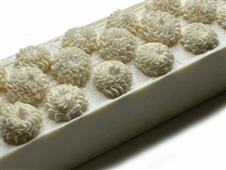 Beautiful, hand-piped soap with coconut milk and Himalayan pink salt with light floral fragrance.