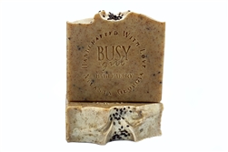 ultra-exfoliating vegan soap with turmeric, carrot, mango butter, and walnut for exfoliation with tangerine scent.