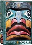 EuroGraphics Totem Pole Comox Valley BC by Kirs Krug 1000 Piece Puzzle. Box size: 10" x 14" x 2.37". Finished Puzzle Size: 19.25" x 26.5". The ancient practice of totem carving has been handed down through generations as a way of preserving the history an