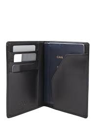 PASSPORT LEATHER RFID COVER.  Genuine leather cover with three credit card slots and passport pocket.  Dimensions are 5.5 X 4.25 inches.