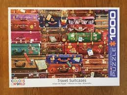 TRAVEL SUITCASES - PUZZLE - 1000 PC.  High quality puzzle of various old style suitcases.