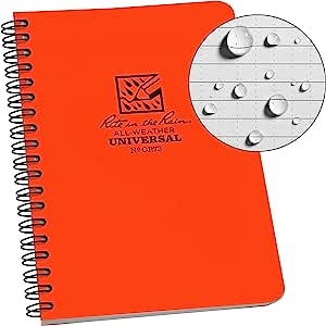 OR73 - RITE IN THE RAIN UNIVERSAL NOTEBOOK.  Orange with a side spiral.  Made with a Polydura cover and wire-o binding, 4 5/8 in x 7 inches. This book is waterproof.