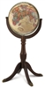 Sherbrooke 16 inch World Globe. Make a statement. This elegant solid-wood stand has brass claw feet and antique brass-plated meridian enhance the rich parchment ocean of this classic 16 inch raised relief globe. Special details include decorative cartouch