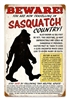 Beware Sasquatch Vintage Metal Sign. This sign reads BEWARE - You are now travelling in Sasquatch Country. Also known as Bigfoot or Yeti, this creature is very unpredictable and could be dangerous if provoked. Measures 12 inches by 18 inches. This Metal S