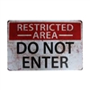 RESTRICTED AREA DO NOT ENTER VINTAGE METAL SIGN.   This is a reproduction of a vintage sign showing wear and tear marks for originality.  Metal.  Size is 11.5 by 17.5 inches.