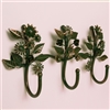 This floral wall hook comes with three hooks and features a soothing gold  finish. The hook has two key-hole hook on either ends for easy mounting.  This floral wall hook will look