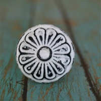 Round Metal Cabinet Knob With Floral Pattern in Distressed White