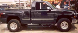 N-Fab's Wheel-to-Wheel Nerf Steps for '99-'06 Chevy/GMC C1500/C2500 Regular Cab Long Bed