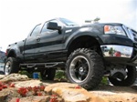 N-Fab's Wheel-to-Wheel Nerf Steps for '04-'08 Ford F150 Quad Cab Short Bed