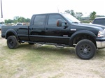 N-Fab's Wheel-to-Wheel Nerf Steps for '87-'97 Ford F250/F350 Crew Cab Long Bed