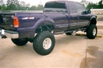 N-Fab's Wheel-to-Wheel Nerf Steps for '99-'09 Ford F250/F350 Quad Cab Long Bed