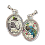 This two sided, charm has the word Imagine on the front with an elephant in a top hat illustration