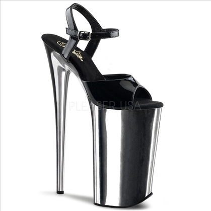 Hover over the crowd and draw attention with these silver chrome platform and silver chrome 10 inch heel, 6 1/4 inch platform, ankle strap sandals by Pleasers.