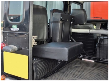 DA4067 - Fits Defender Rear Inward Facing Seat in Black Vinyl - Flip up Style Seat