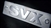 LR010367 - Fits Defender SVX Tailgate Badge in Metal - For Genuine Land Rover