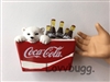 Cooler of Cokes with Bear