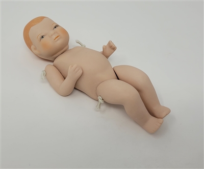 Zim's Porcelain Jointed Baby Doll Set
