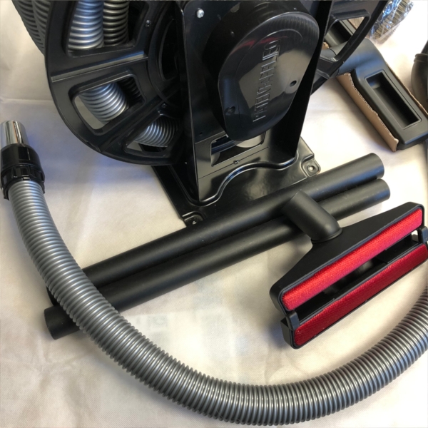 Hose with Hose Reel and Cleaning Tool Kit. Featuring Hand Held Turbo Brush,  Light Duty Reel. Clearance Unit. Compare at $399.