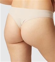This nude Simone Perele thong is designed for minimal coverage and maximum support and features bonded finishes for full invisibility under clothing