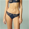 Blue coloured thong with guipure and lace embroidered front panels by designer label Simone Perele.